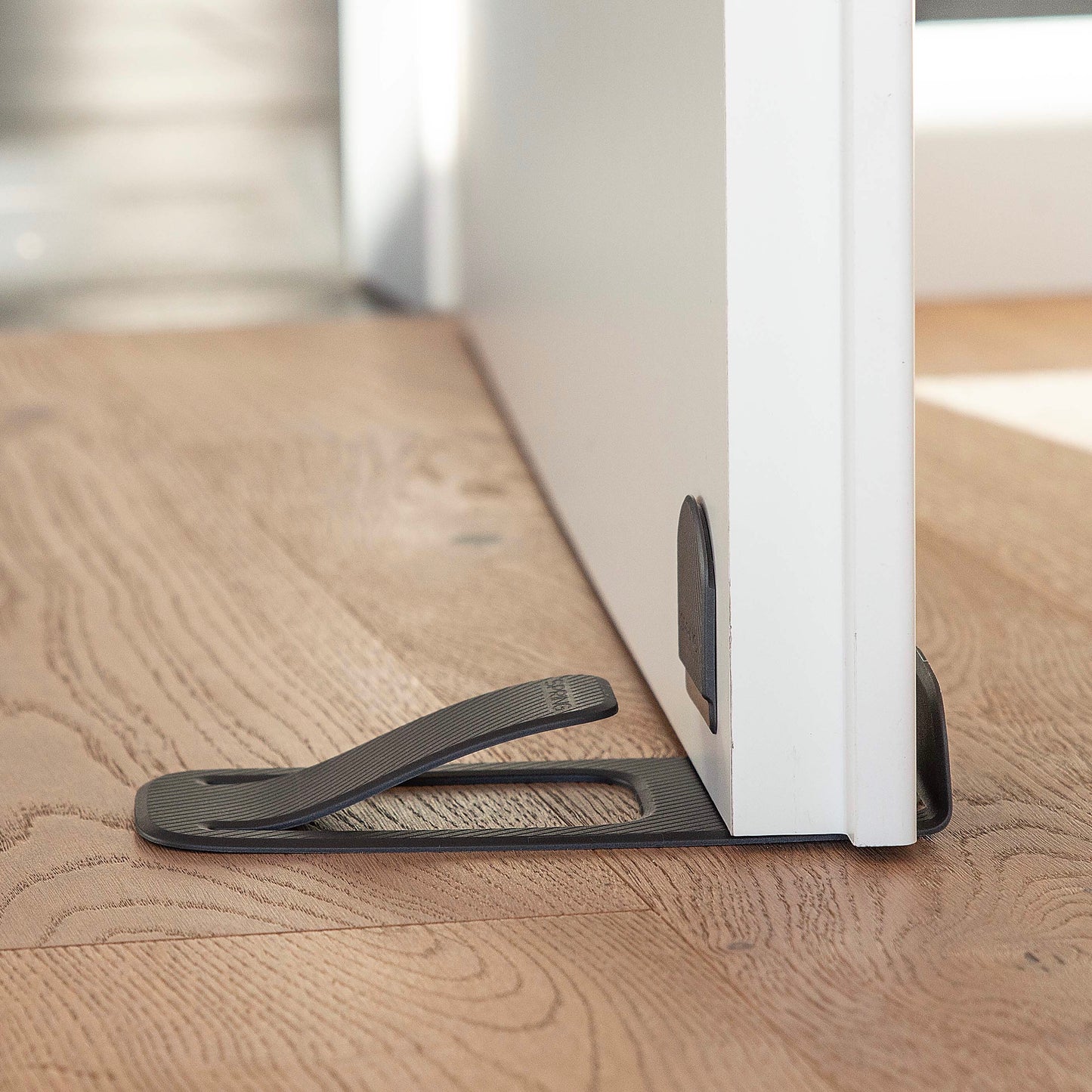 DoorStop SPRING – Compact Door Holder, No Drilling, Adhesive Mount, 42g, 3M Tape