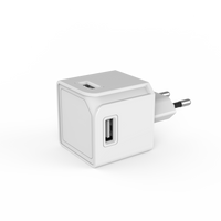 USB-Cube Original: Compact 4-port USB-A hub with high-speed data transfer and smart charging capabilities, featuring a sleek and modern design