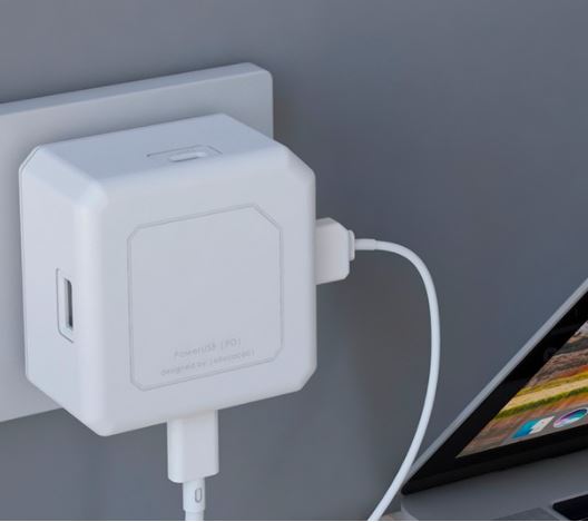 USB-Cube Power 60W USB-PD charger featuring multiple ports for fast and efficient power delivery. Compact design ideal for home or travel use.