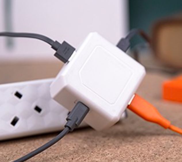 USB-Cube Power 60W USB-PD charger featuring multiple ports for fast and efficient power delivery. Compact design ideal for home or travel use.